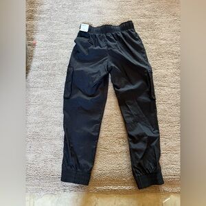 Nike black and white Windrunner suit. Size Youth Large